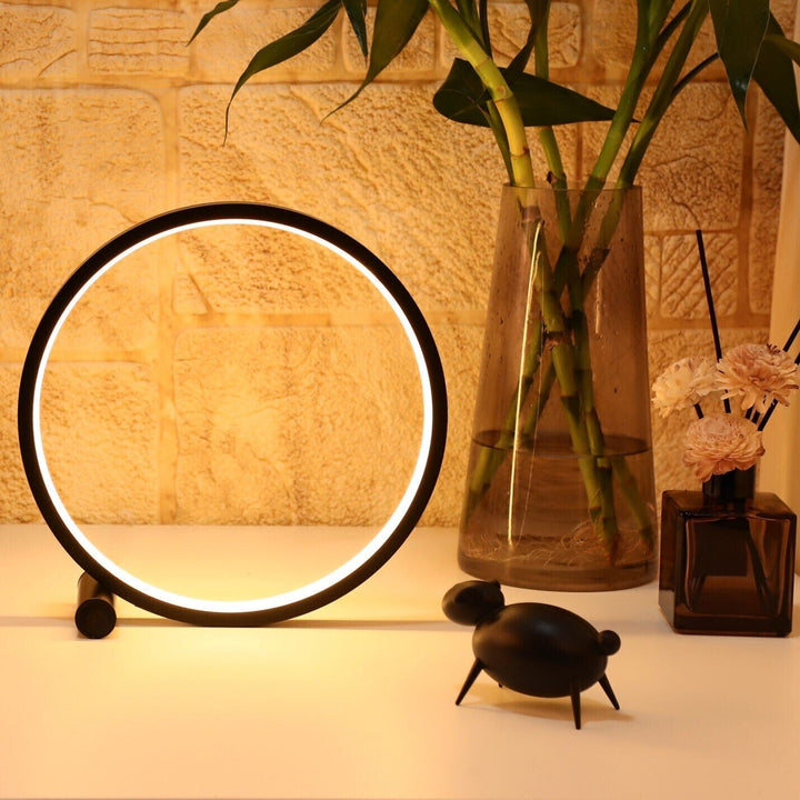 Nvroome Lights modern halo LED nightstand lamp, dimmable ambient light, ideal for bedroom & living room.