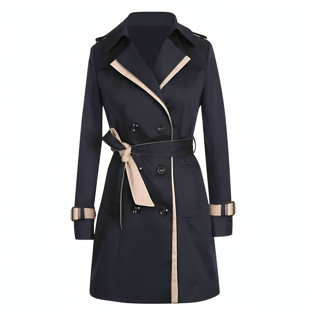 Fashionable women's long trench coat with stylish belt. An elegant and versatile outerwear choice for women.