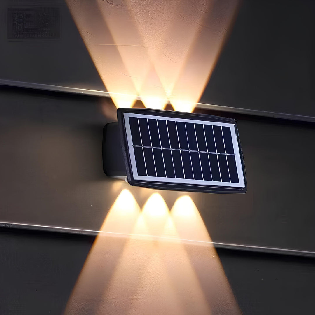 Solar-powered LED wall sconce, automatically illuminating gardens and pathways with warm or white light.