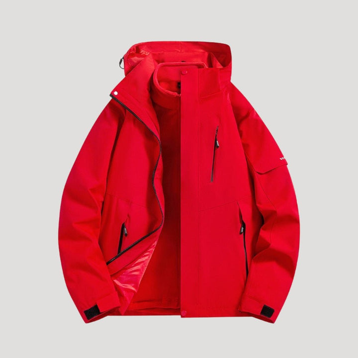 Comfortable unisex waterproof hooded jacket with zip pockets. Stylish all-season outerwear for outdoor activities.