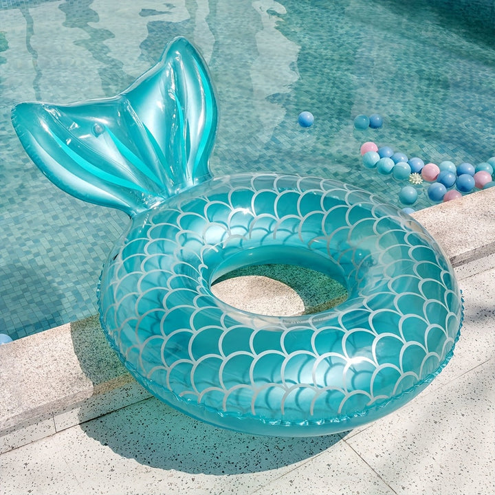 Stylish adult mermaid shell float for swimming pools, designed with a comfortable head support pillow.