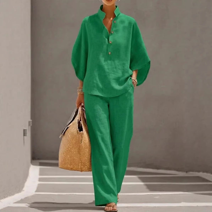 Modern women's spring/summer two piece outfit; short sleeve top & straight leg pants for casual style.