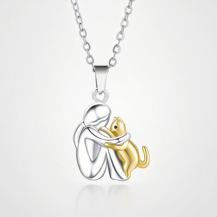 Women's Pet Love Pendant Necklace: girl embracing her dog design. Sentimental jewelry for dog lovers.