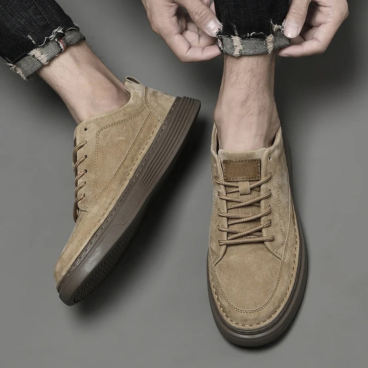 Brown men's premium sneakers offering classic style and ultimate comfort for daily wear.