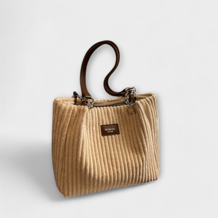 Khaki women's trendy shoulder bag, a stylish everyday handbag. Modern purse with ample space for essentials.