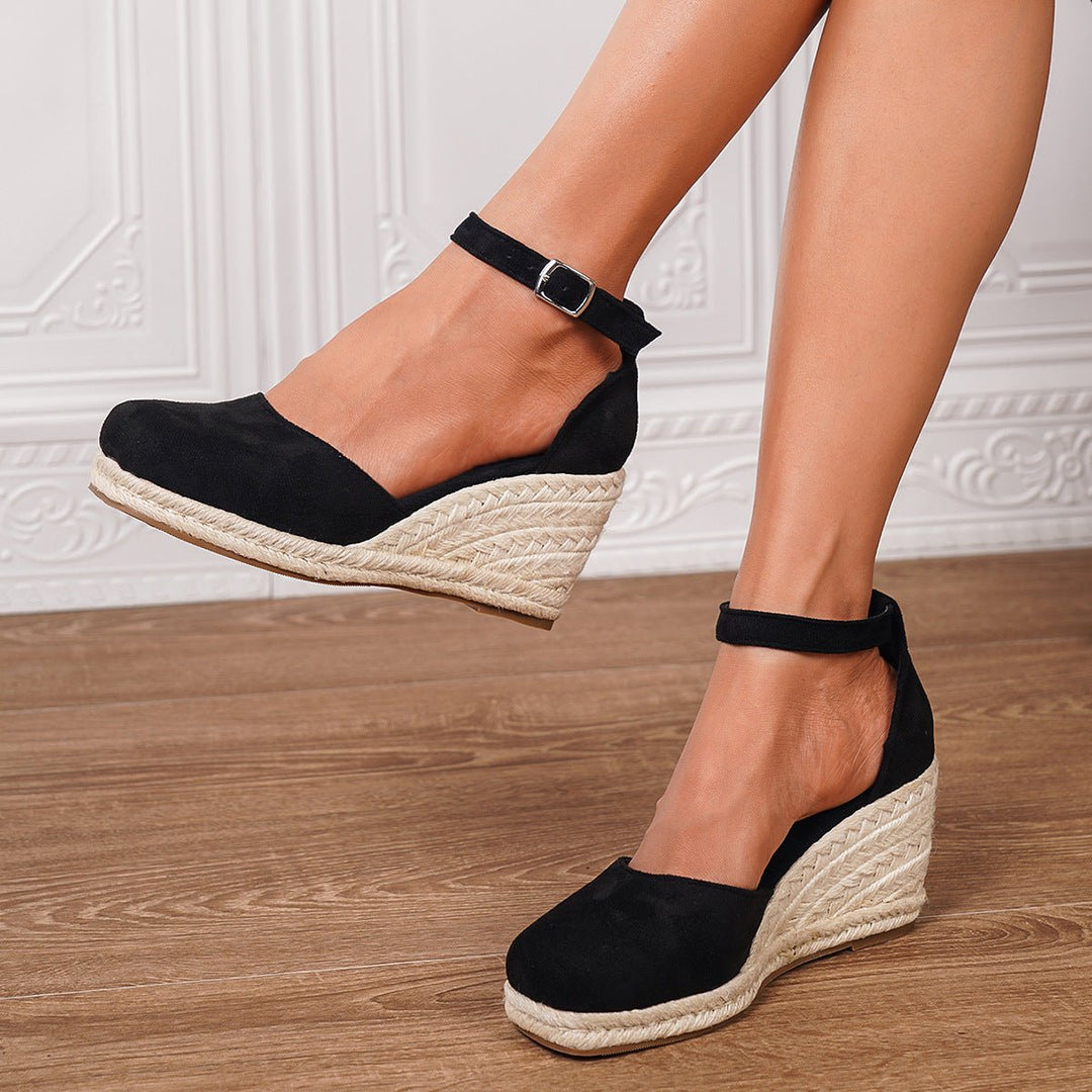 Fashionable women's wedge sandals. Casual summer footwear with an adjustable ankle strap for comfort and style.