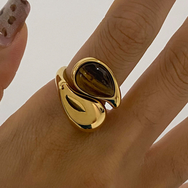 Vintage women's elegant ring, featuring amber & pearl style. A stylish statement accessory for her.