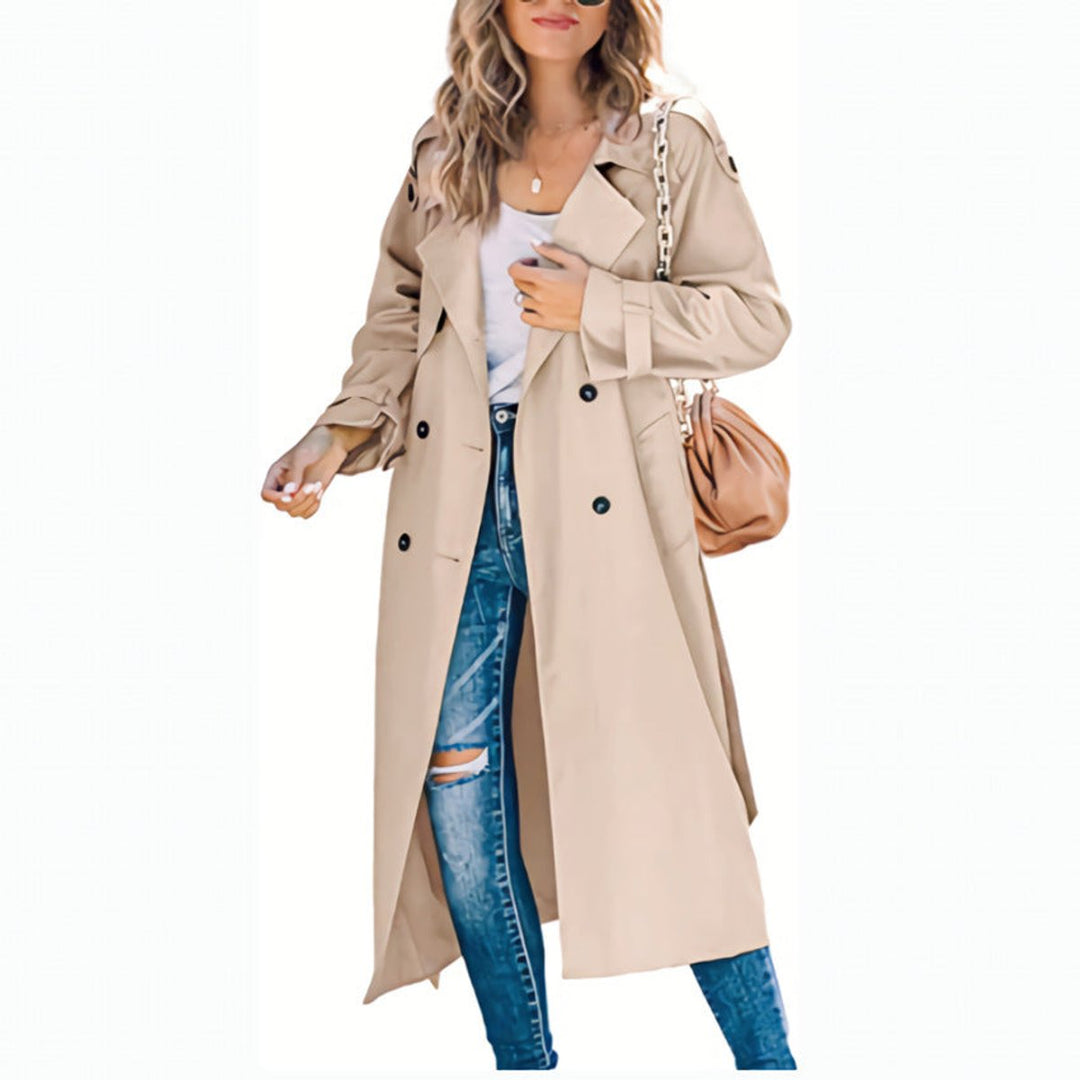 Elegant women's oversized double-breasted trench coat, featuring stylish lapels & waist-cinching tie belt.