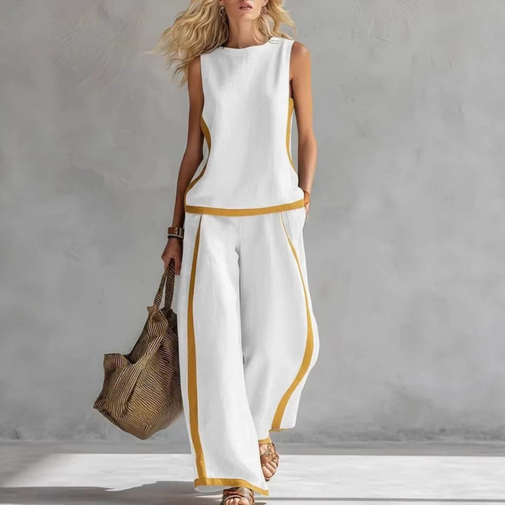 Relaxed fit women's sleeveless top with matching high-waist wide-leg pants. A comfortable and chic coordinated set.