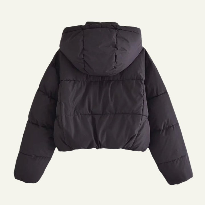 High-quality women's black puffer jacket. Comfortable, lightweight & warm winter outerwear for all occasions.