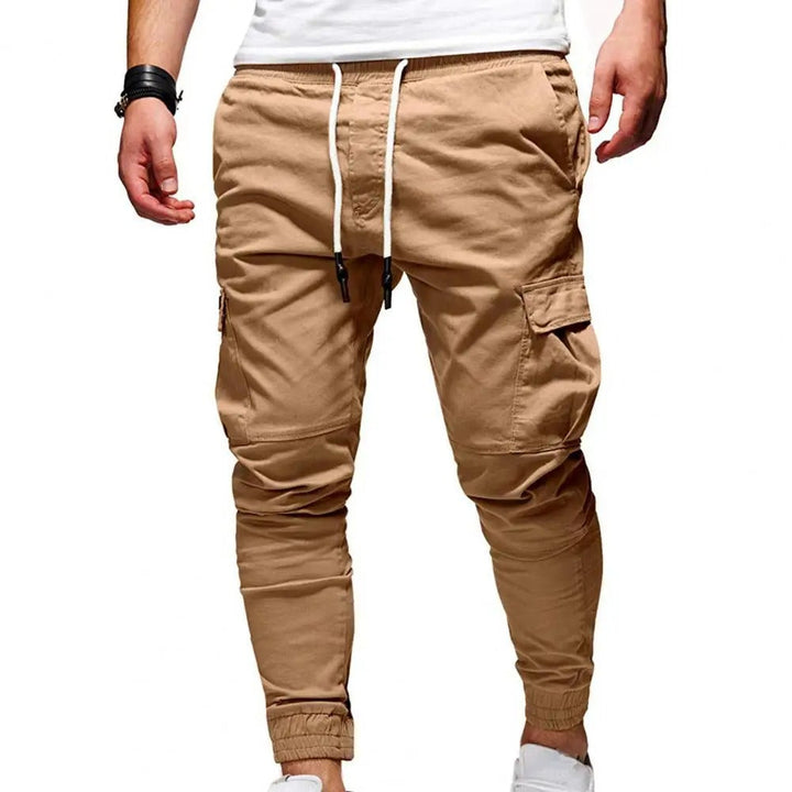 Versatile men's stretch cargo pants with multiple pockets, offering modern style and functional comfort for travel.
