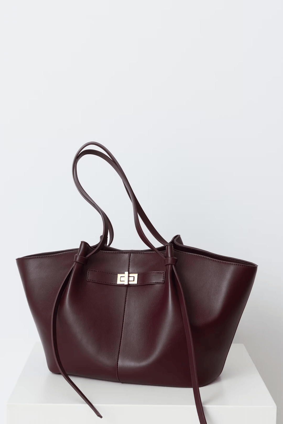 Verona Structured Shoulder Bag paired with accessories, showcasing its sophisticated everyday appeal.