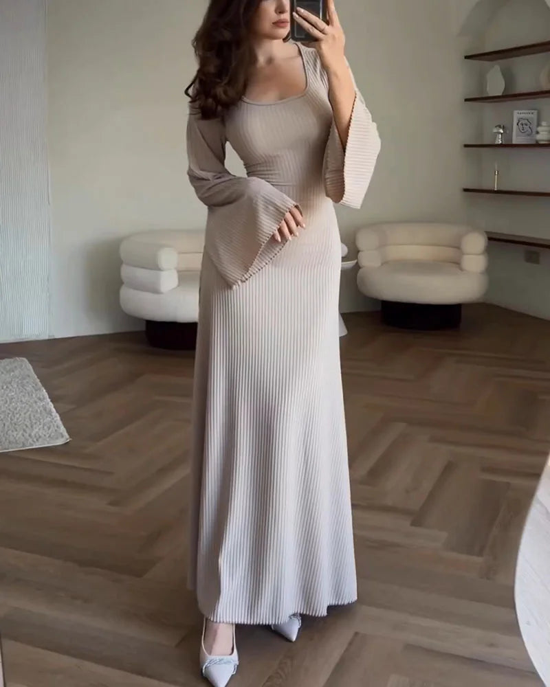Modest long-sleeve maxi dress for women, offering an elegant and sophisticated look.