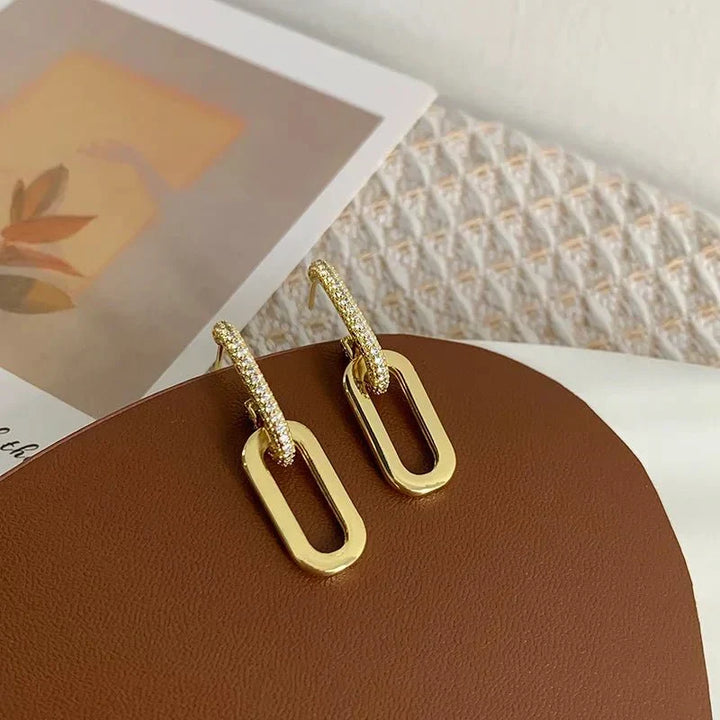 Fashionable slim gold hoop earrings for women, stainless steel, a deluxe accessory.