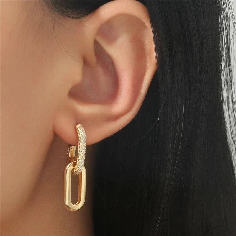 Women's slim deluxe gold hoop earrings, stainless steel & elegant fashion accessory.