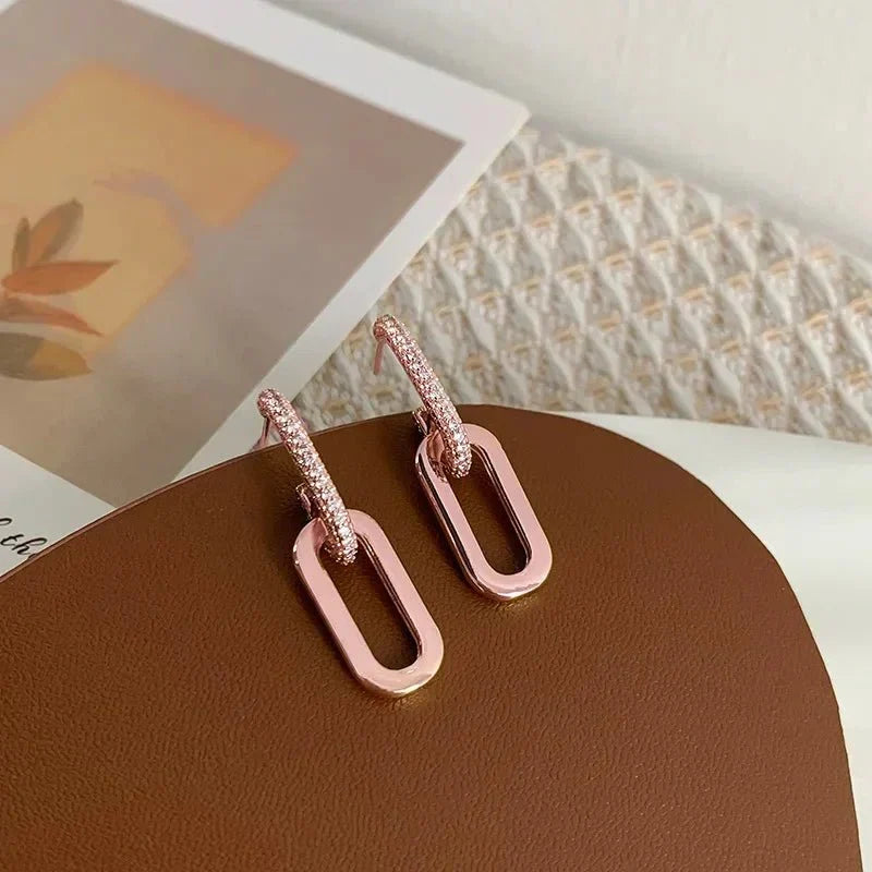 Rose gold slim hoop earrings for women, a stylish and elegant fashion accessory.