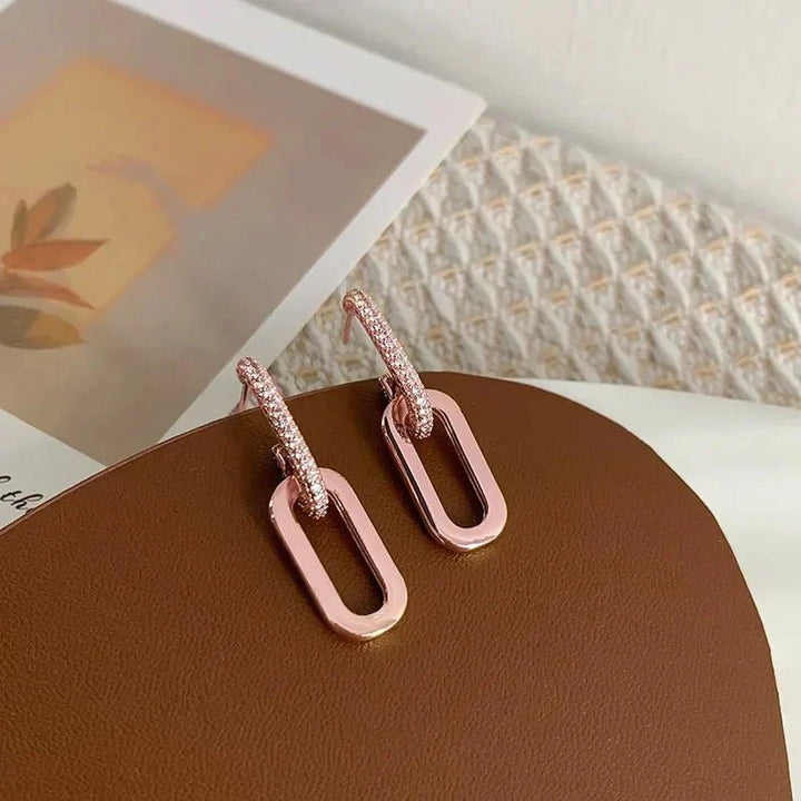 Rose gold slim hoop earrings for women, a stylish and elegant fashion accessory.