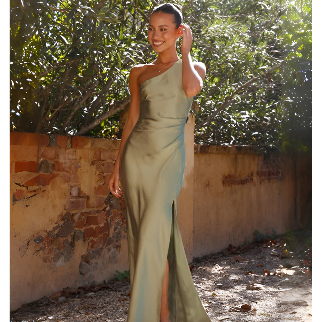 Women's formal one shoulder green maxi dress with a stylish side slit, ideal as a wedding guest or races dress.