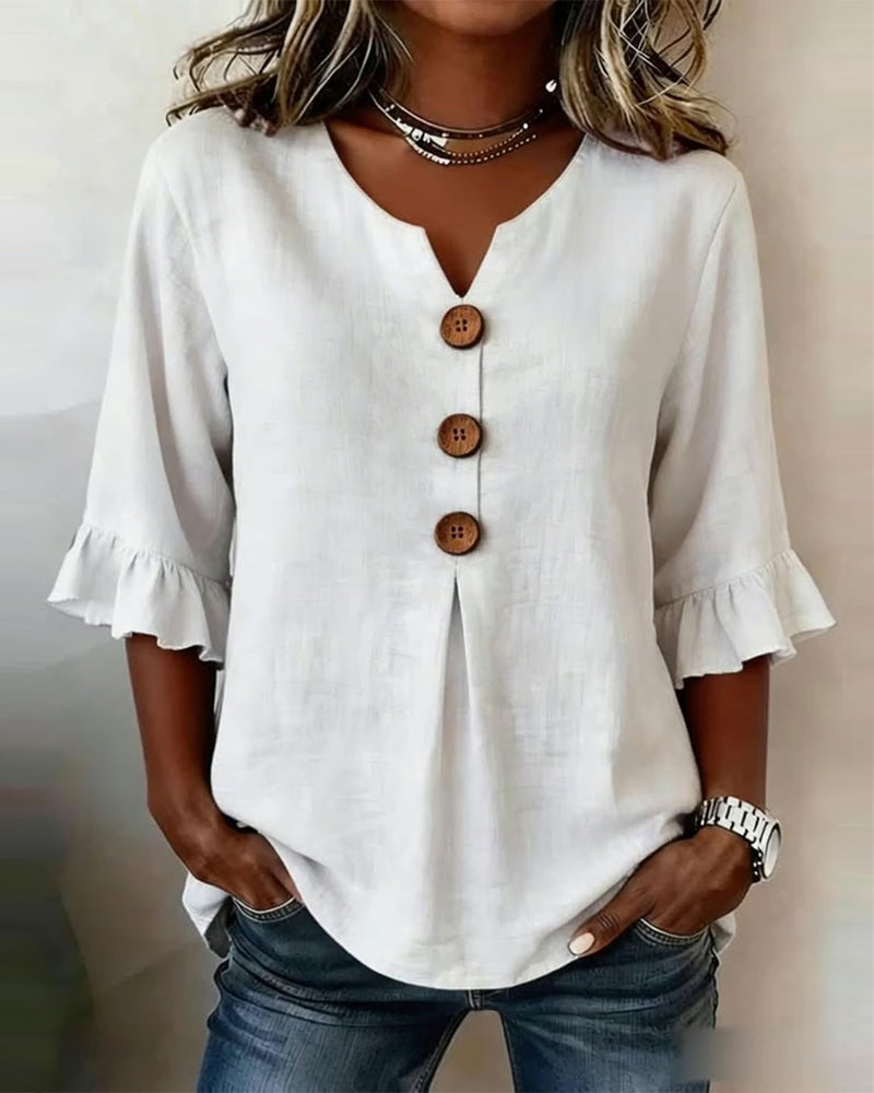 Sophisticated women's summer blouse with ruffle sleeves & button front, perfect for warm weather.