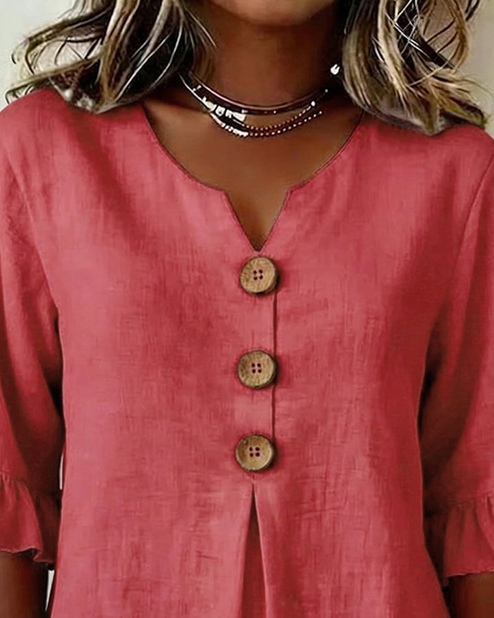 Sophisticated women's blouse, button-down front, airy ruffle sleeves, for a polished look.