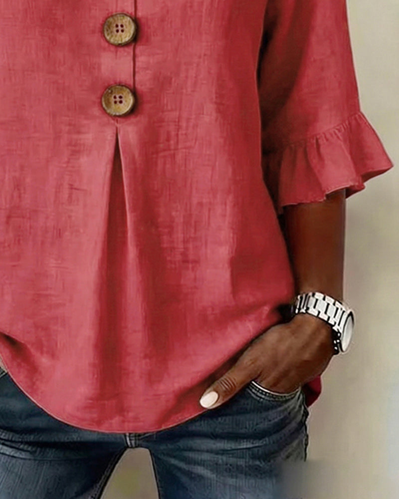 Comfortable women's summer top, v-neck, ruffle sleeves, and easy button-front style.