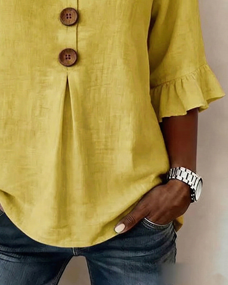 Ladies summer blouse, v-neck, ruffle sleeves, and a classic button front for everyday wear.