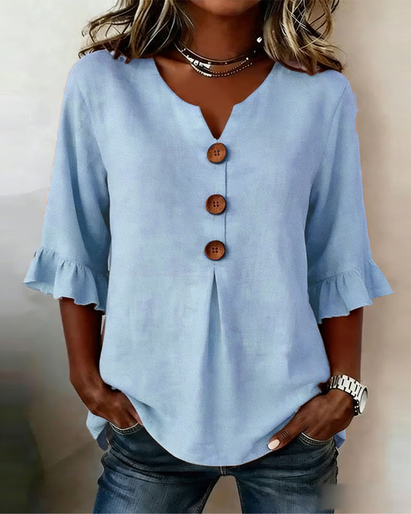 Relaxed fit women's summer shirt, button-front design with chic ruffle sleeves.