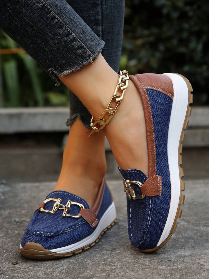 Women's orthopedic support loafers, slip-on design, chic gold accent, comfortable non-slip sole.