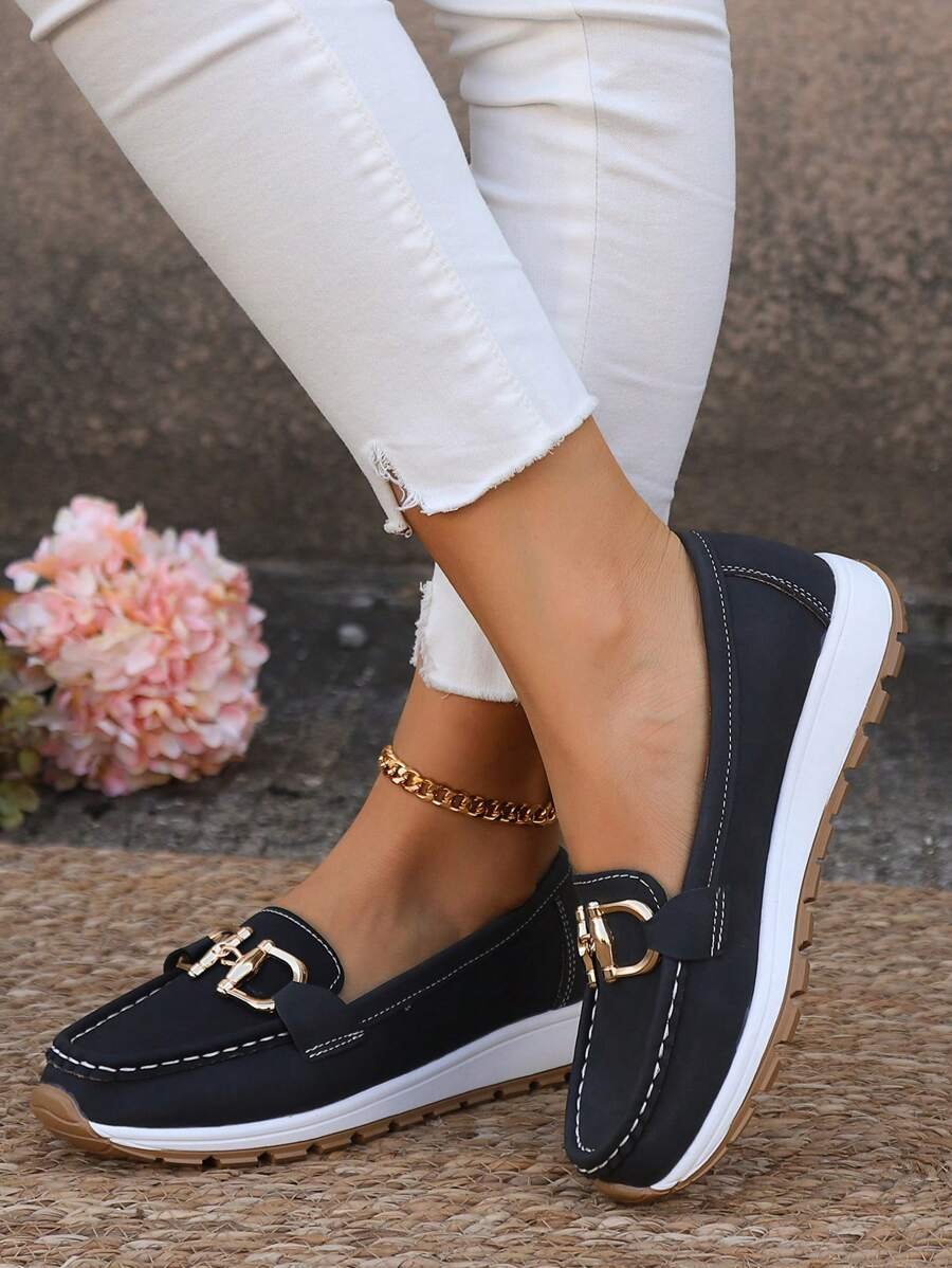 Women's orthopedic slip-on loafers with elegant gold accent, comfortable daily wear.