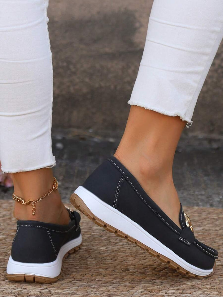 Comfortable women's slip-on orthopedic loafers, stylish gold accent, versatile daily footwear.