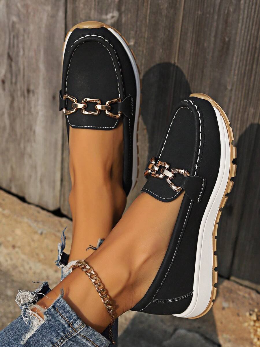 Elegant women's slip-on loafers, gold accent, easy wear, perfect for casual or daily use.
