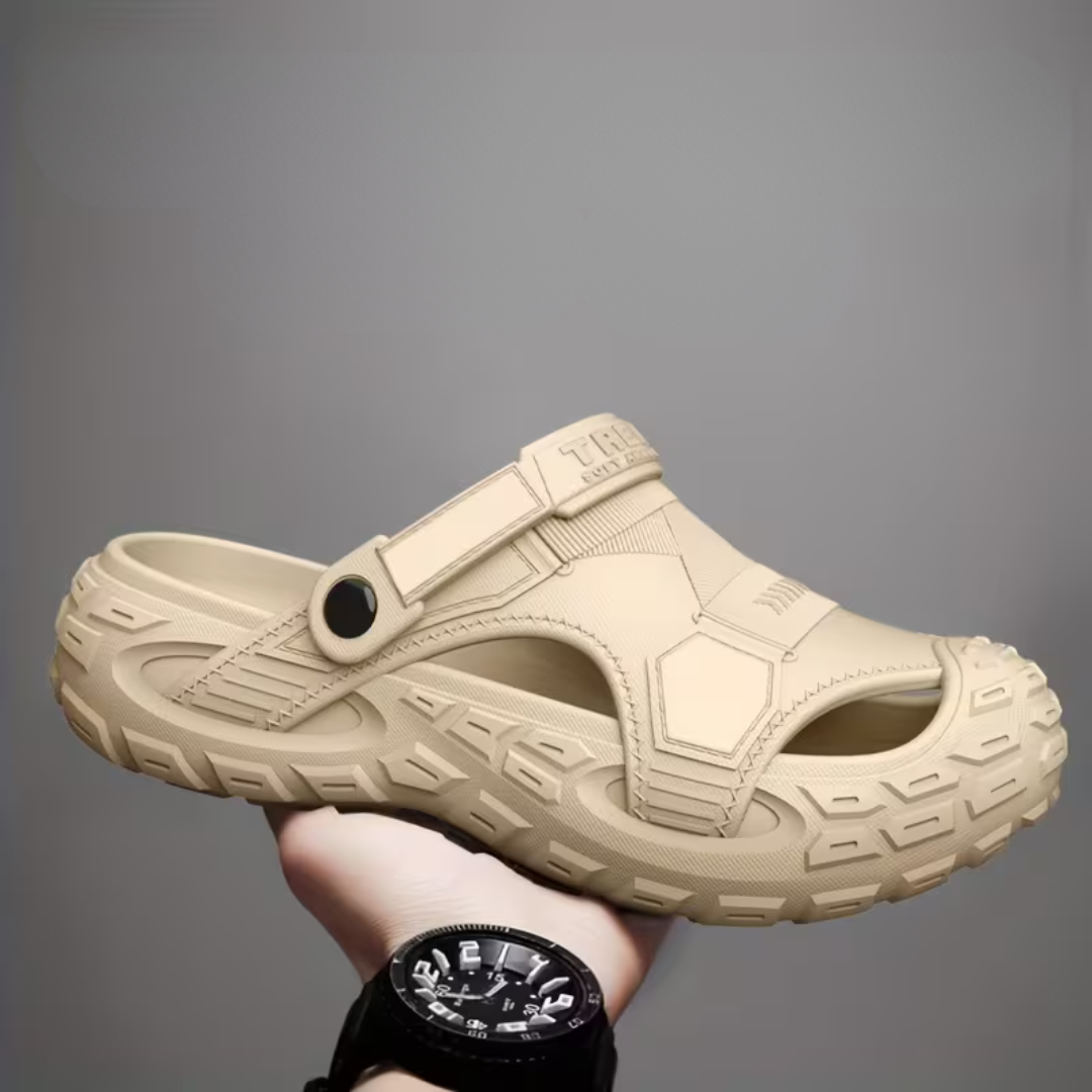 Supportive men's clogs for outdoor comfort, featuring a slip-on design, traction sole, and easy wear.