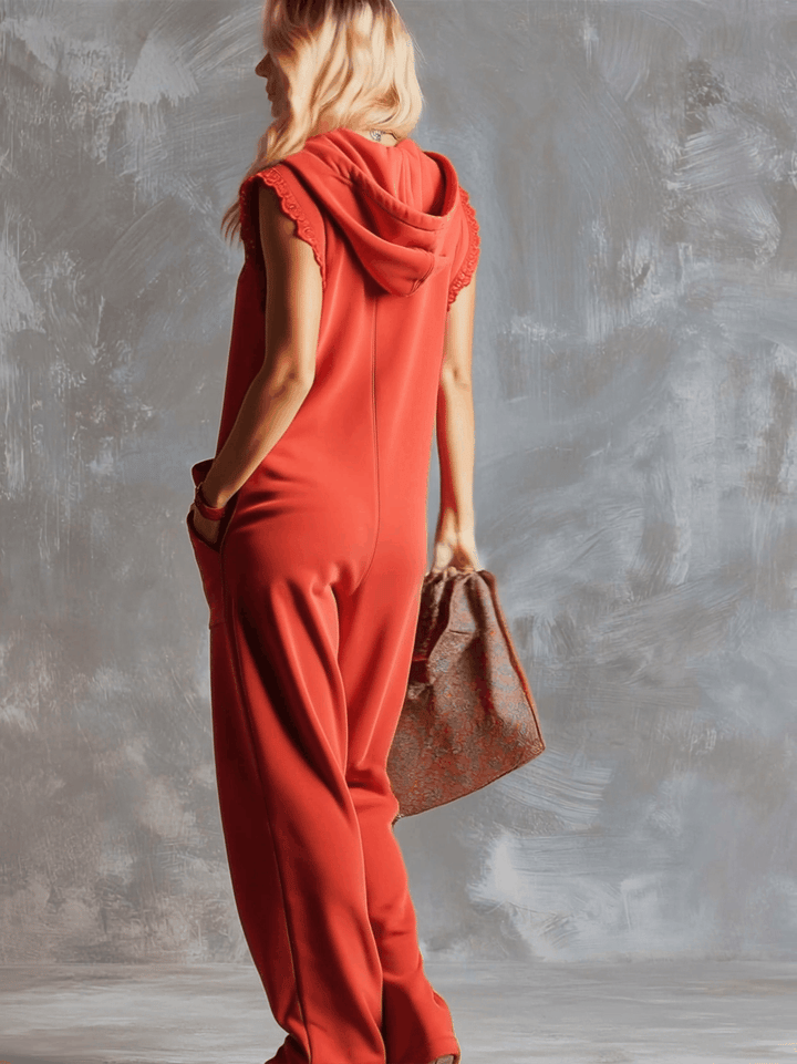 Chic women's sleeveless wide-leg jumpsuit with a hood. Relaxed fit for ultimate comfort and everyday styling.