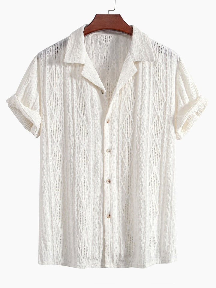 Textured men's camp collar shirt with short sleeves & relaxed fit. Ideal for warm weather style.