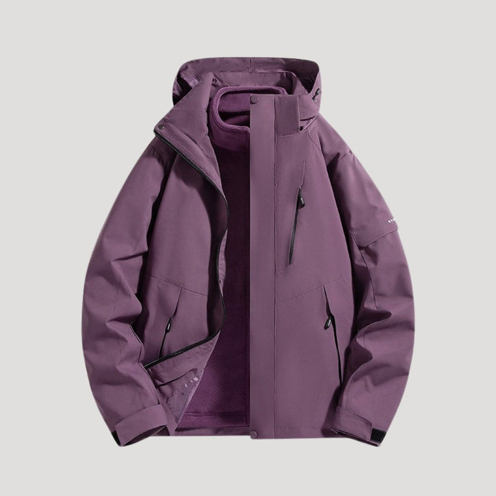Versatile unisex waterproof hooded jacket. Perfect all-season outdoor coat for hiking, travel, and adventure.