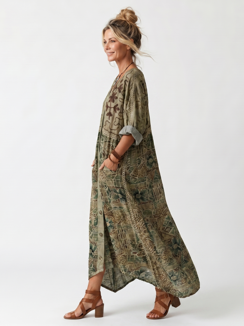 Embroidered women's midi dress, oversized fit, button-front design. Casual and comfortable for everyday wear.