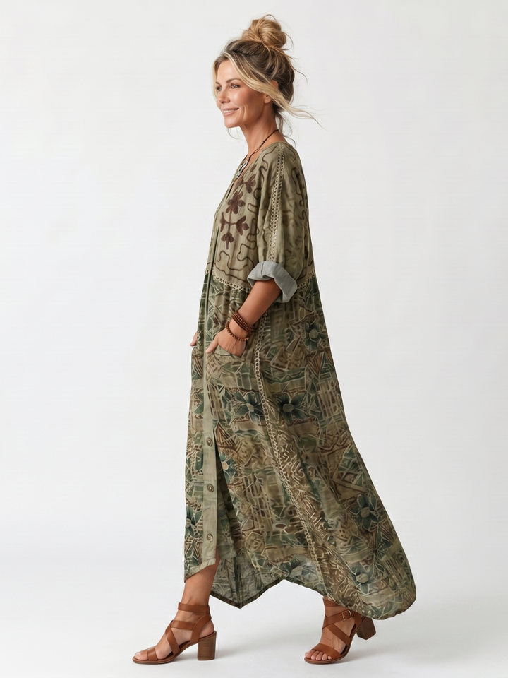 Embroidered women's midi dress, oversized fit, button-front design. Casual and comfortable for everyday wear.