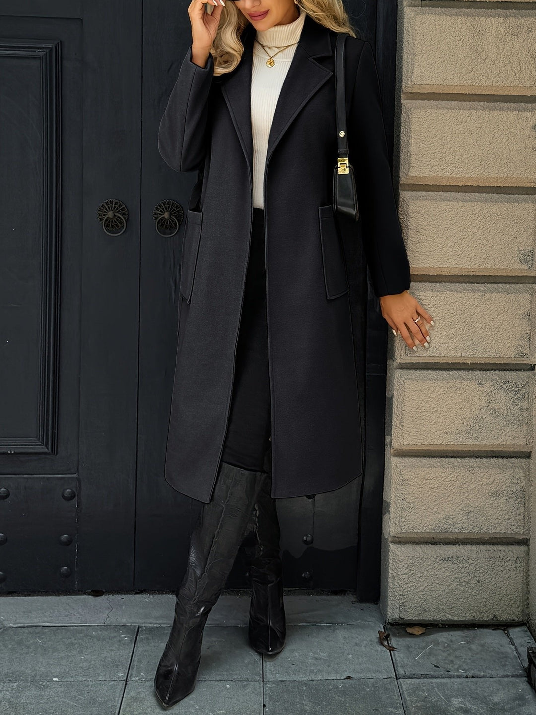 Full length view of a women's elegant long belted trench coat. Timeless tailored outerwear for formal wear.