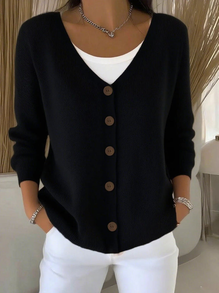 Comfortable V-neck button-knit sweater for women, a long-sleeve cardigan with feminine style for seasonal layering.