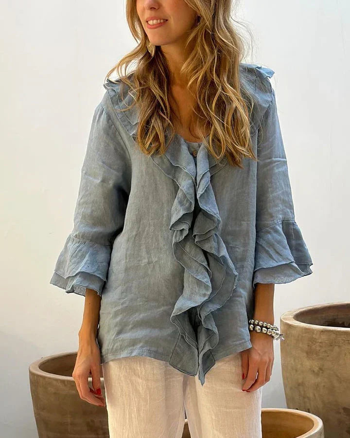 Elegant women's ruffled 3/4 sleeve blouse, perfect for versatile spring & summer fashion.
