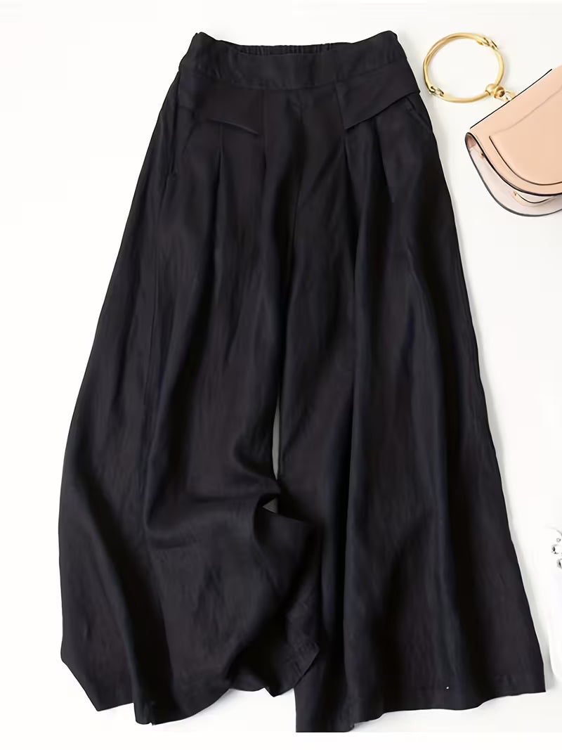 Relaxed fit women's wide-leg pants with an elastic waist, excellent for everyday style.