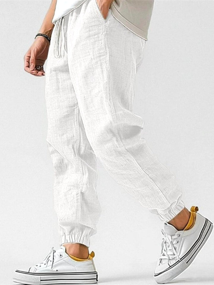 Stylish men's tapered leg joggers with a relaxed fit, ideal for activewear or leisure.