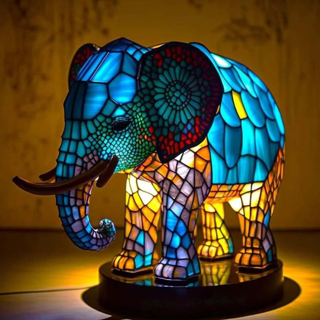 Ambient lighting from a decorative table lamp with a fantasy creature.