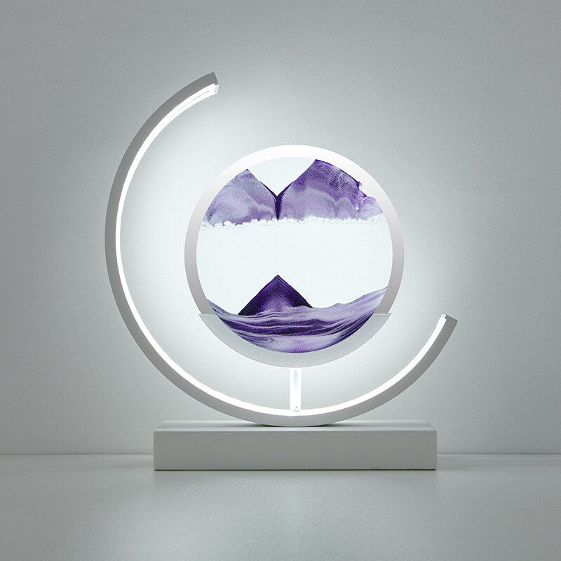 LED illuminated moving sand art for relaxation, a deep sea kinetic table lamp & unique office decor gift.