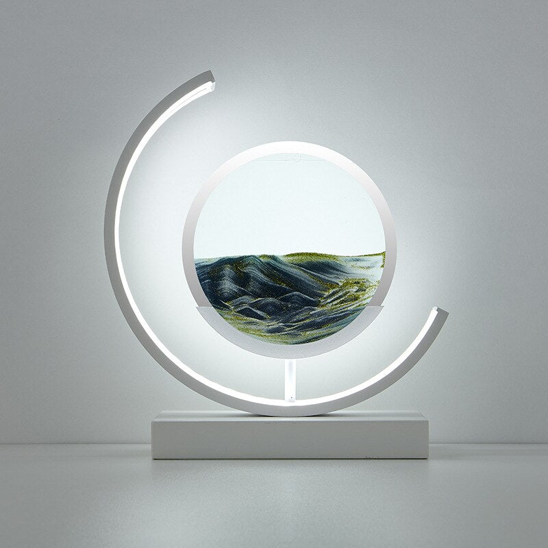 Unique gift: Illuminated moving sand art table lamp, a mesmerizing kinetic display for any room.