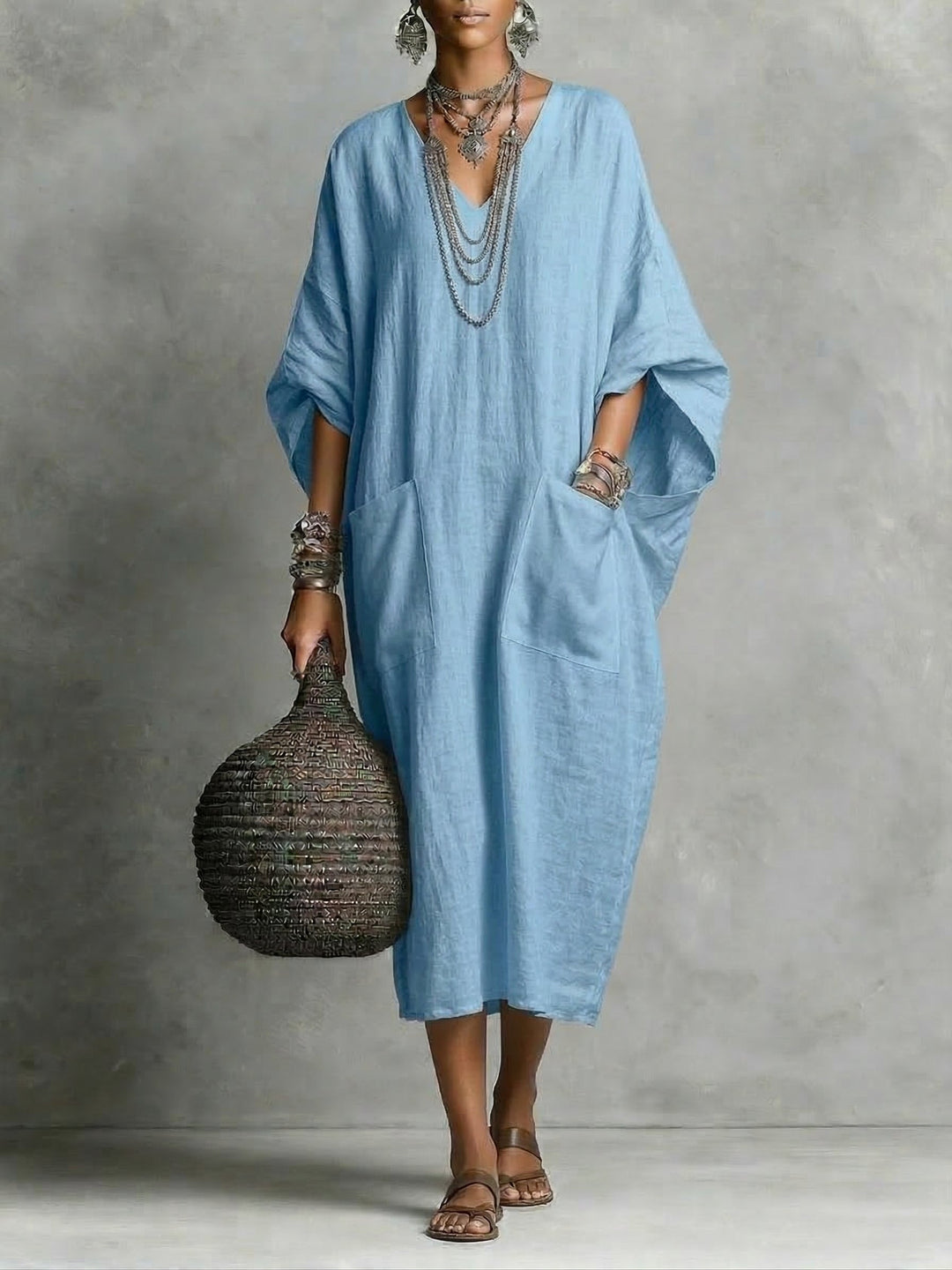Women's chic relaxed kaftan maxi dress with a flowing silhouette, perfect for summer fashion & resort wear.