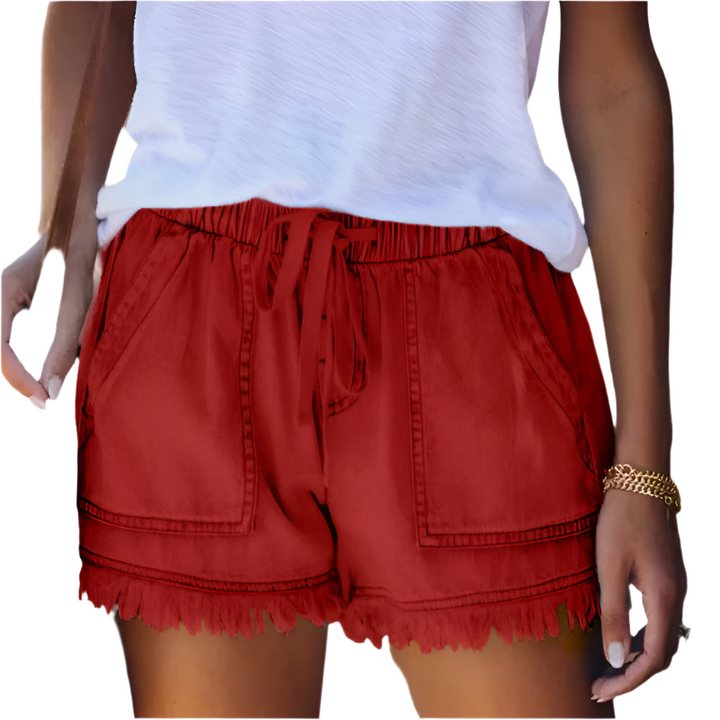 Stylish high-waisted fringe hem denim shorts for women, offering comfort and trendy summer fashion.