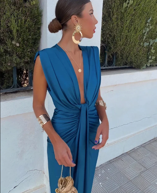 Women's elegant sleeveless wrap midi dress with a flattering fit, perfect for stylish summer day and casual wear.