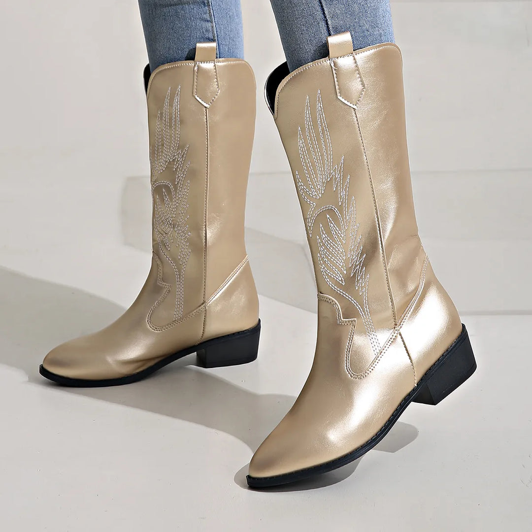 Elegant stitching detail on women's fashion cowboy boots with a chic pointed toe.