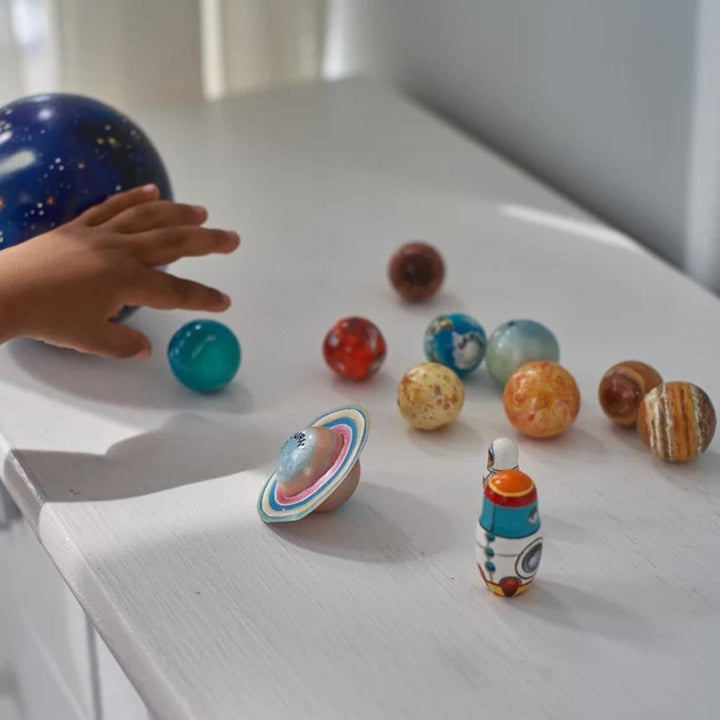 Wooden solar system planet set for kids. Hands-on educational toy promoting early science learning and universe discovery.